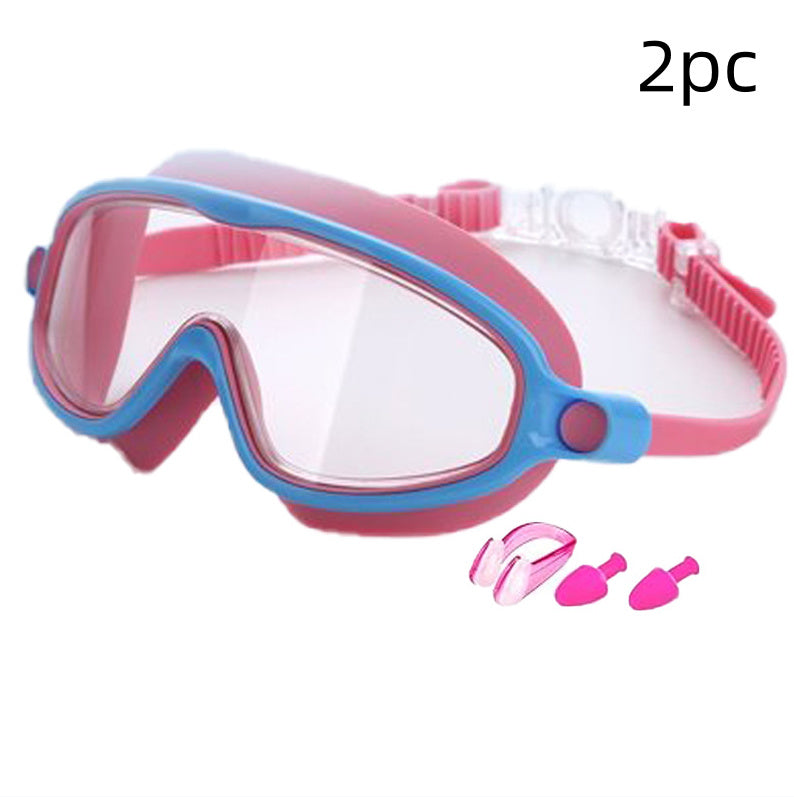 Pink and blue swim goggles with additional components on a white background