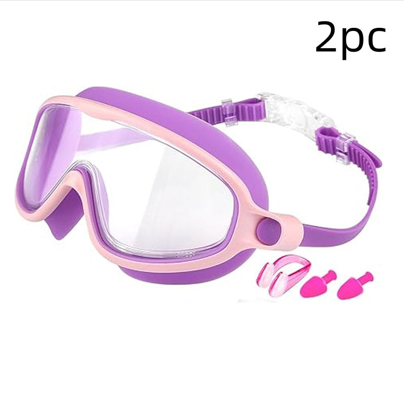 Purple and pink diving mask with snorkel and earplugs on a white background