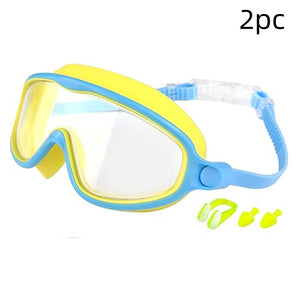Yellow and blue swim mask with earplugs on a white background