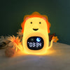 Lion-shaped night light with digital clock on a dark background