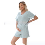 Woman wearing a light blue outfit on a white background