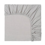 Gray fitted sheet on a white background
