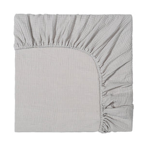 Gray fitted sheet on a white background