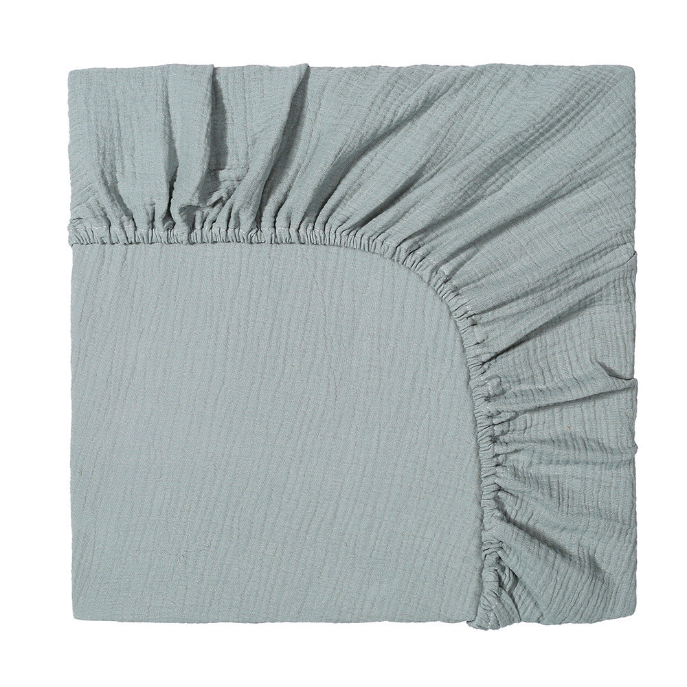 Light blue fitted sheet on a white background