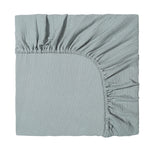 Light blue fitted sheet on a white background