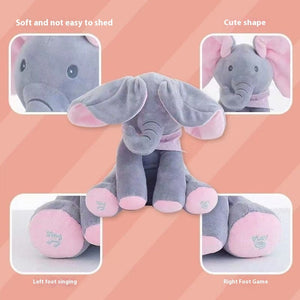 Gray elephant plush toy with pink accents on a peach background