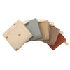Set of five fabric cushions in beige, gray, brown, and rust colors on a white background.