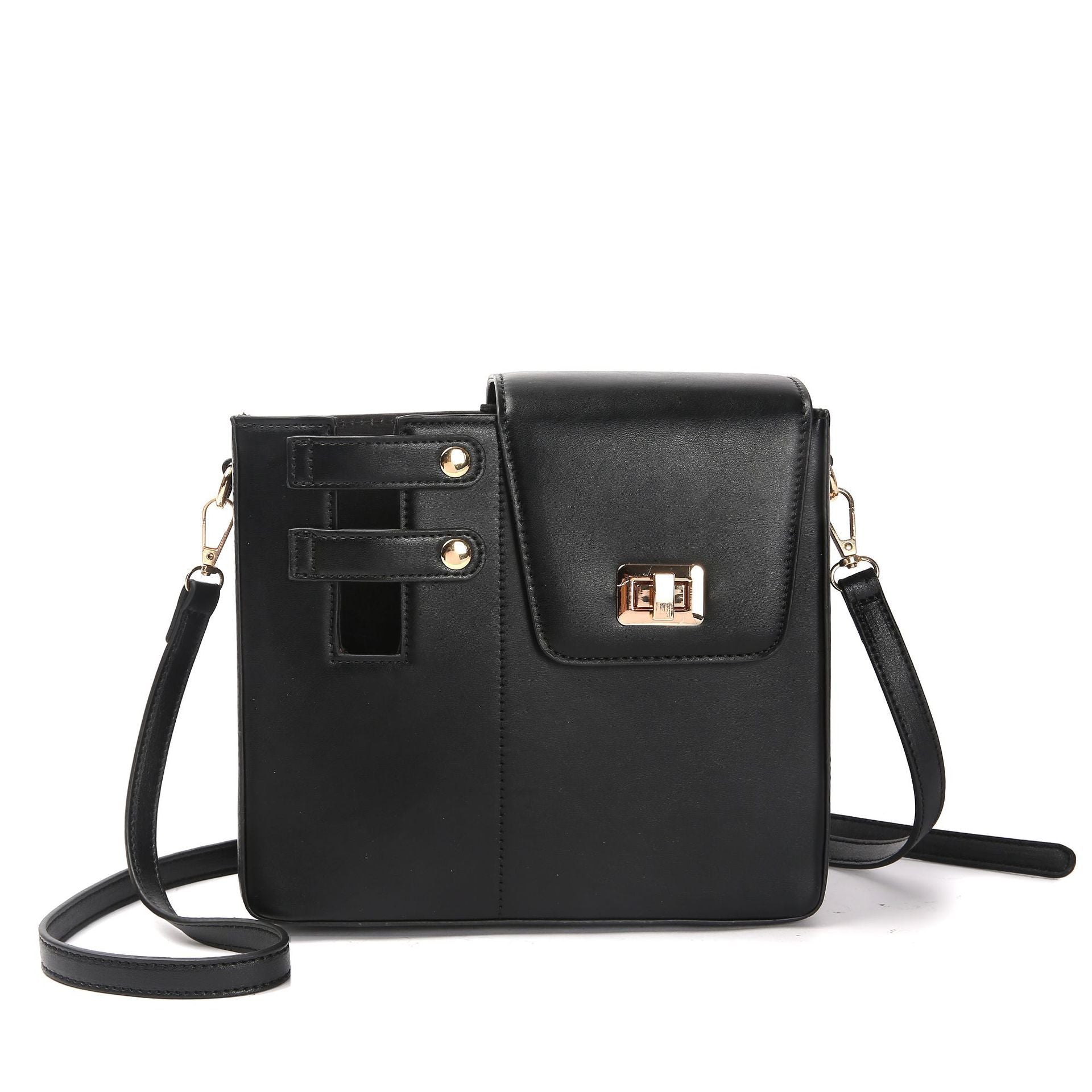Black crossbody bag with gold accents on a white background