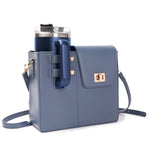 Blue handbag with a matching tumbler on a white background