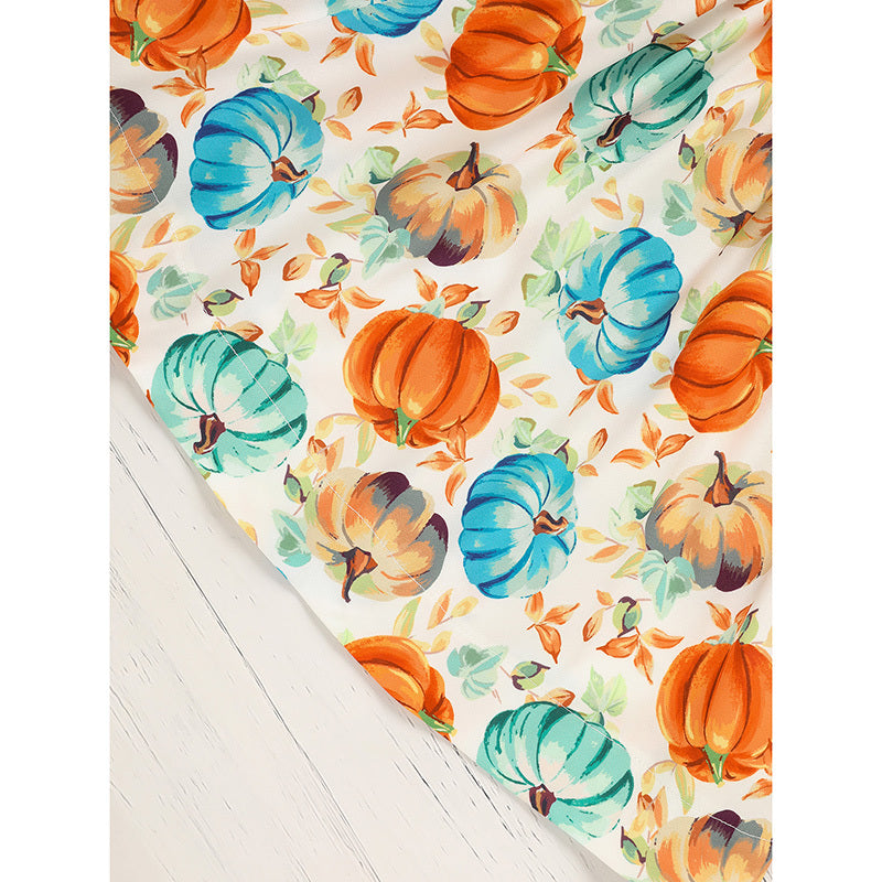 Colorful pumpkin pattern on a white surface
