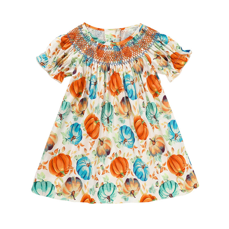 Children's dress with pumpkin pattern on a white background