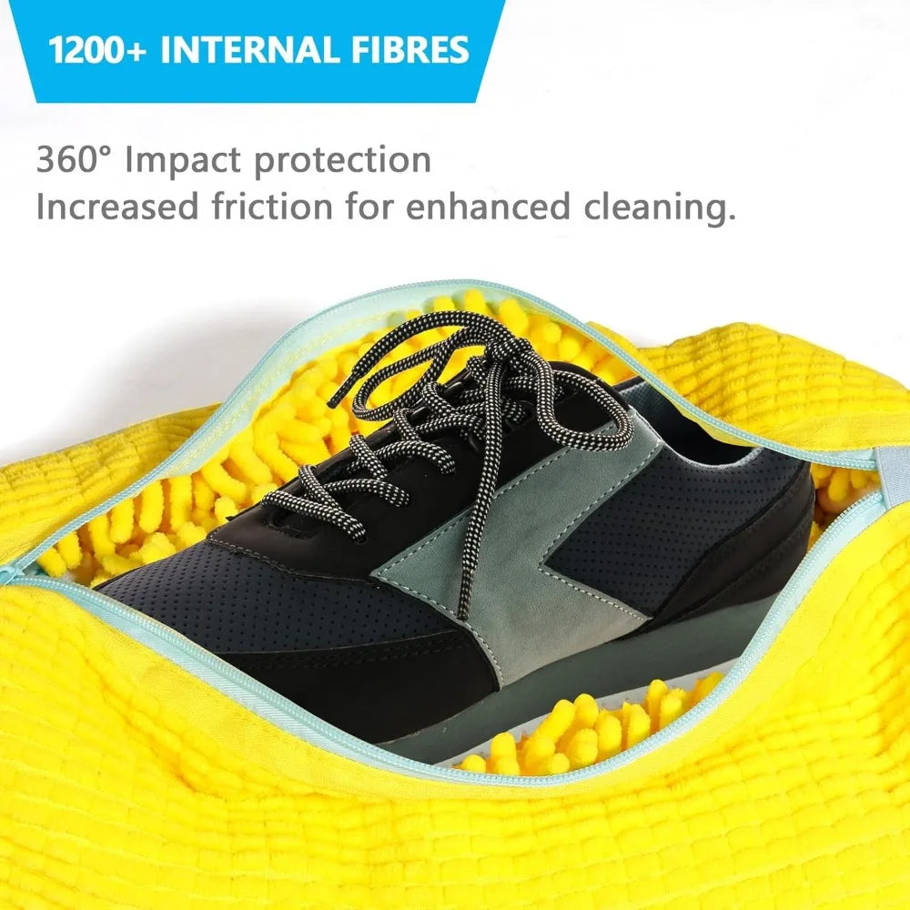 Shoe with yellow interior showing impact protection and cleaning features.