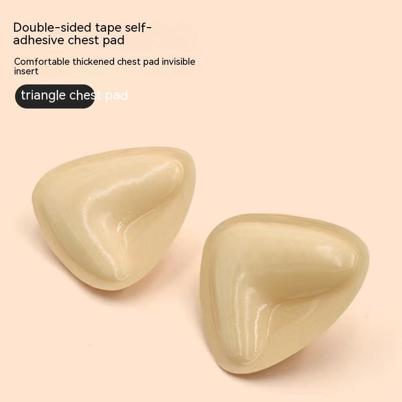 Two beige triangle-shaped chest pads on a light pink background with text describing the product.