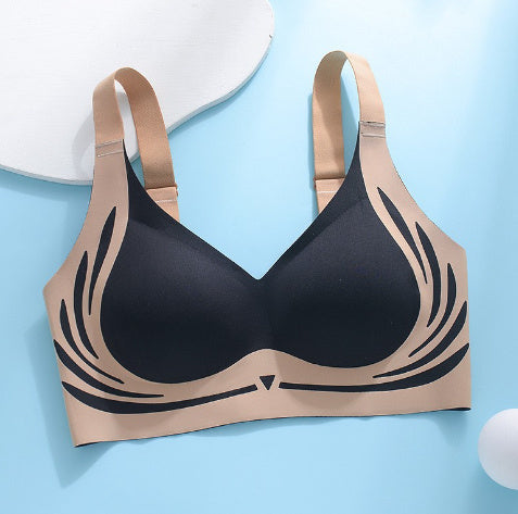 Black and beige bra on a light blue background