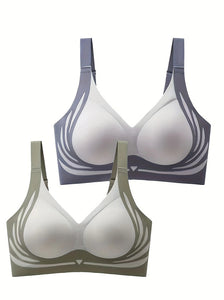 Two bras, one gray and one green, on a white background