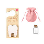 Tooth Fairy kit with pink pouch, wooden plaque, and glass bottle on a white background
