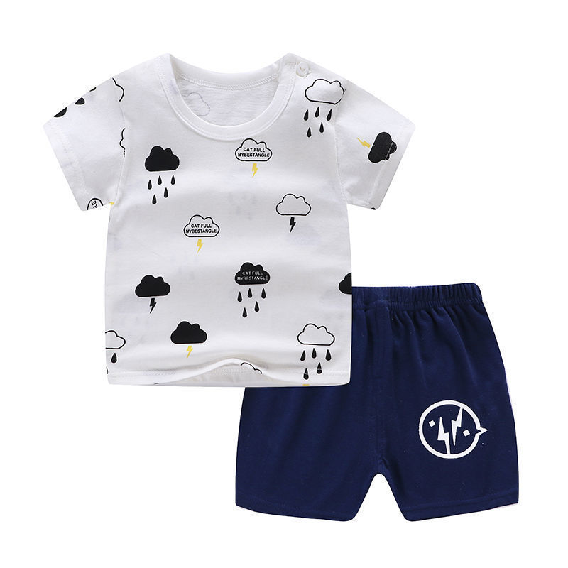 Children's outfit with white t-shirt and navy shorts on a white background