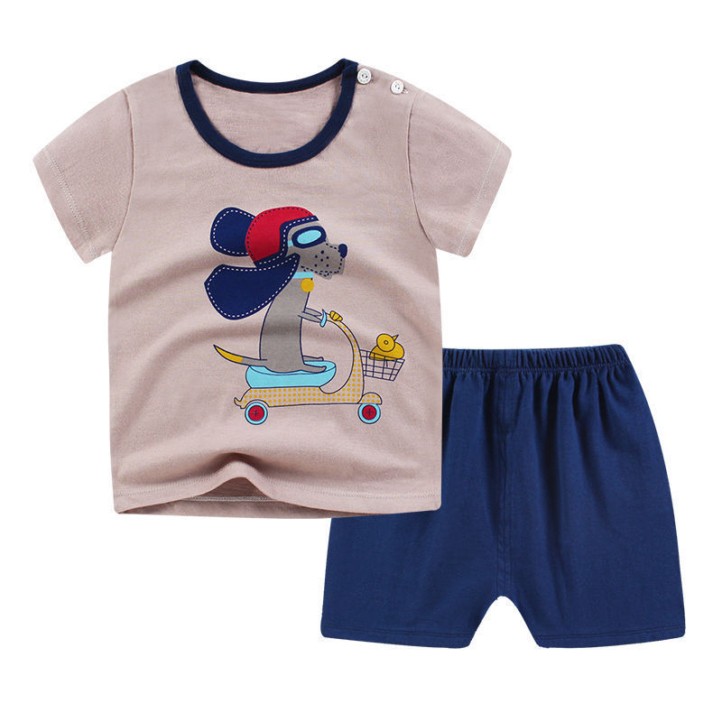 Children's t-shirt with cartoon design and blue shorts on a white background