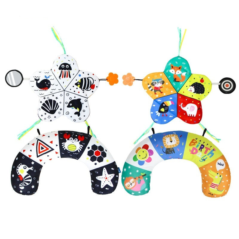 Colorful baby toy with animal designs on a white background