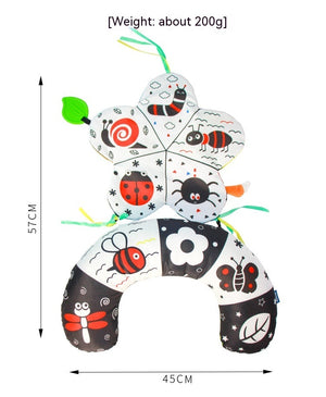 Children's neck pillow with insect designs and measurements on a white background