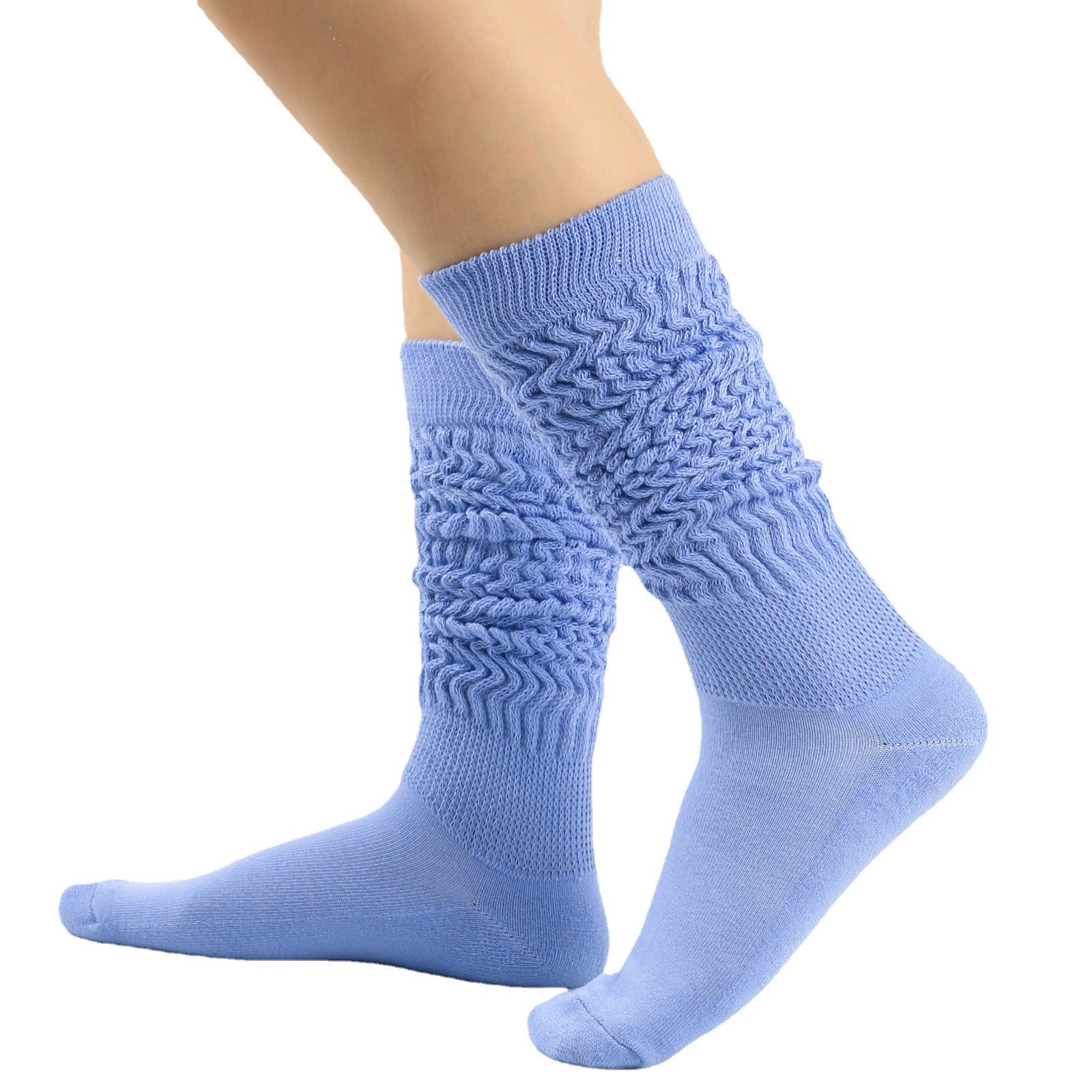 Light blue socks with textured pattern worn by a person on a white background