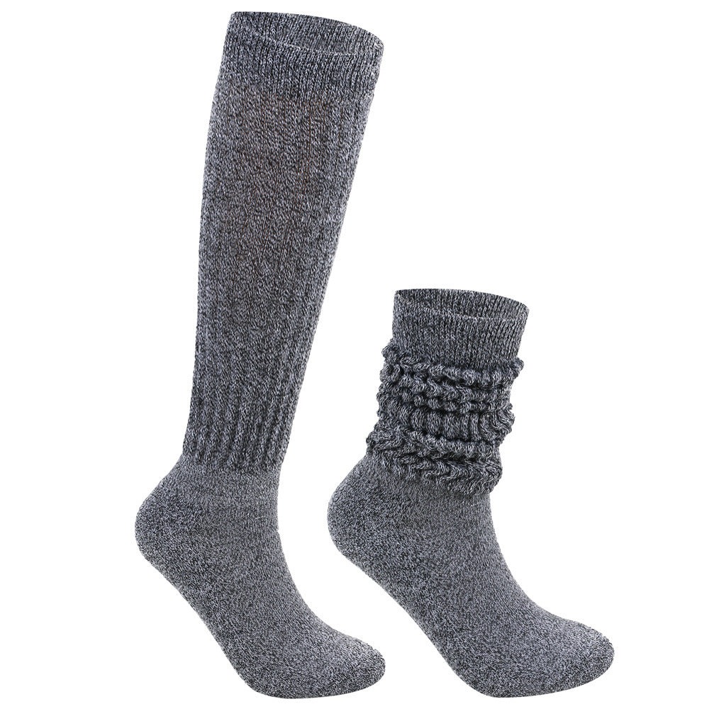 Pair of gray socks with textured pattern on a white background