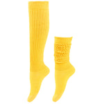Yellow knee-high socks with textured design on a white background
