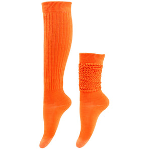 Pair of orange knee-high socks on a white background