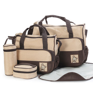 Set of baby bags including a large diaper bag, smaller pouches, and a changing mat on a white background.
