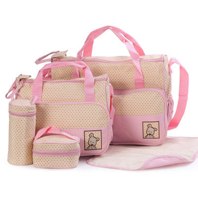Set of pink and beige bags with a teddy bear design on a white background
