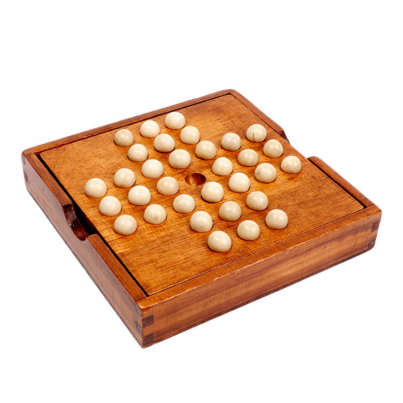 Wooden game board with white pieces on a white background