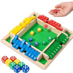 Wooden dice game board with colorful dice on a white background