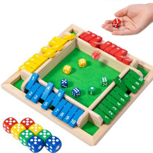Wooden dice game board with colorful dice on a white background
