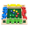 Wooden dice game with colorful dice and numbered blocks on a white background